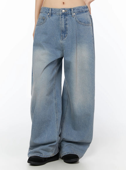 Coleen Side Pleat Baggy Jeans IL502 Blue front view on model from waist to hem showing wide-leg cut side pleat and light wash fading