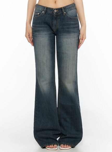 LEWKIN Collins Vintage Washed Bootcut Jeans IL523 Dark blue front shot on model cropped at waist showing low-rise waistband button closure and wide flared leg hem