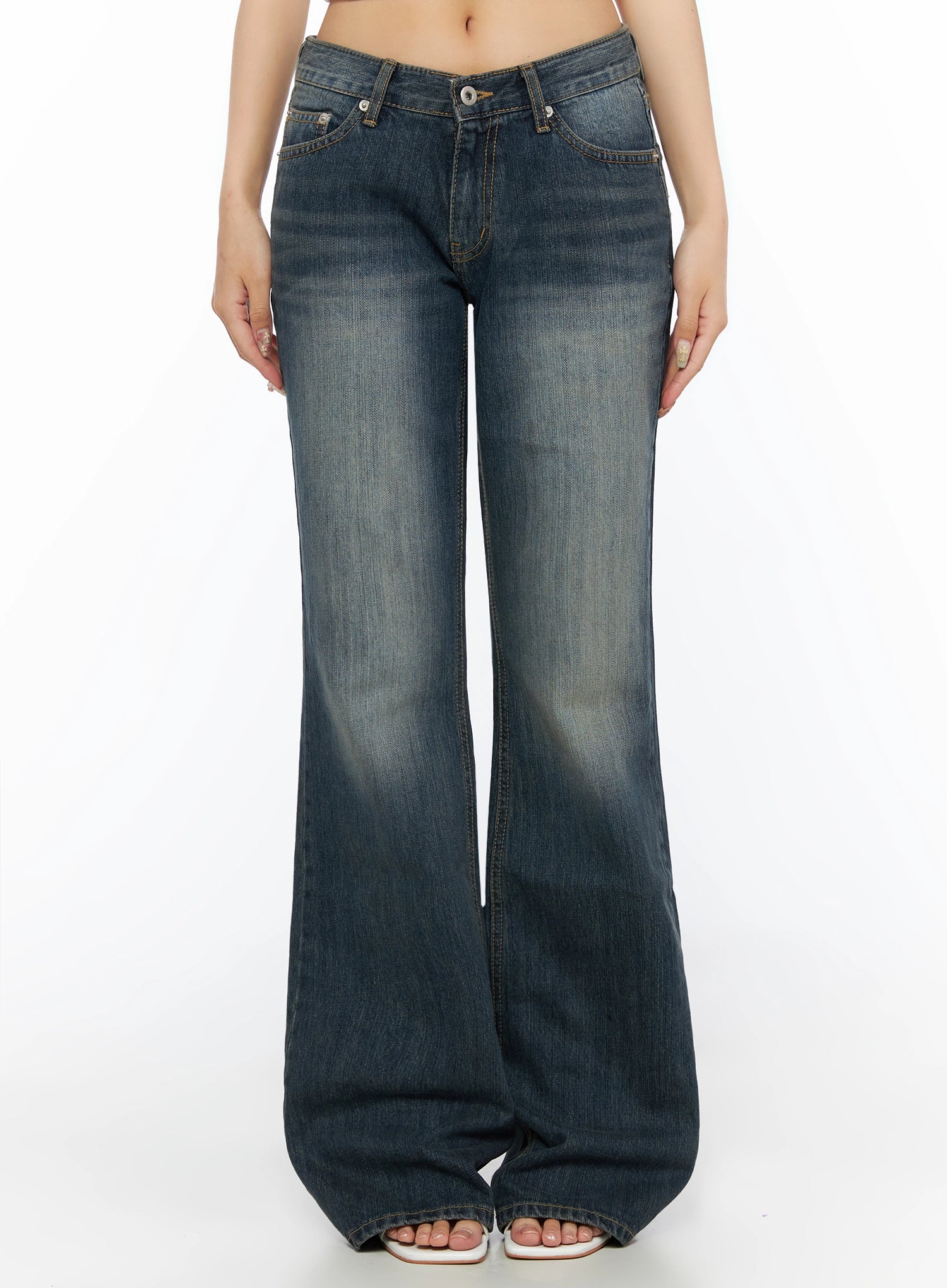 LEWKIN Collins Vintage Washed Bootcut Jeans IL523 Dark blue front shot on model cropped at waist showing low-rise waistband button closure and wide flared leg hem
