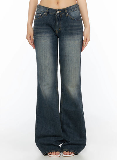 LEWKIN Collins Vintage Washed Bootcut Jeans IL523 Dark blue front shot on model cropped at waist showing low-rise waistband button closure and wide flared leg hem