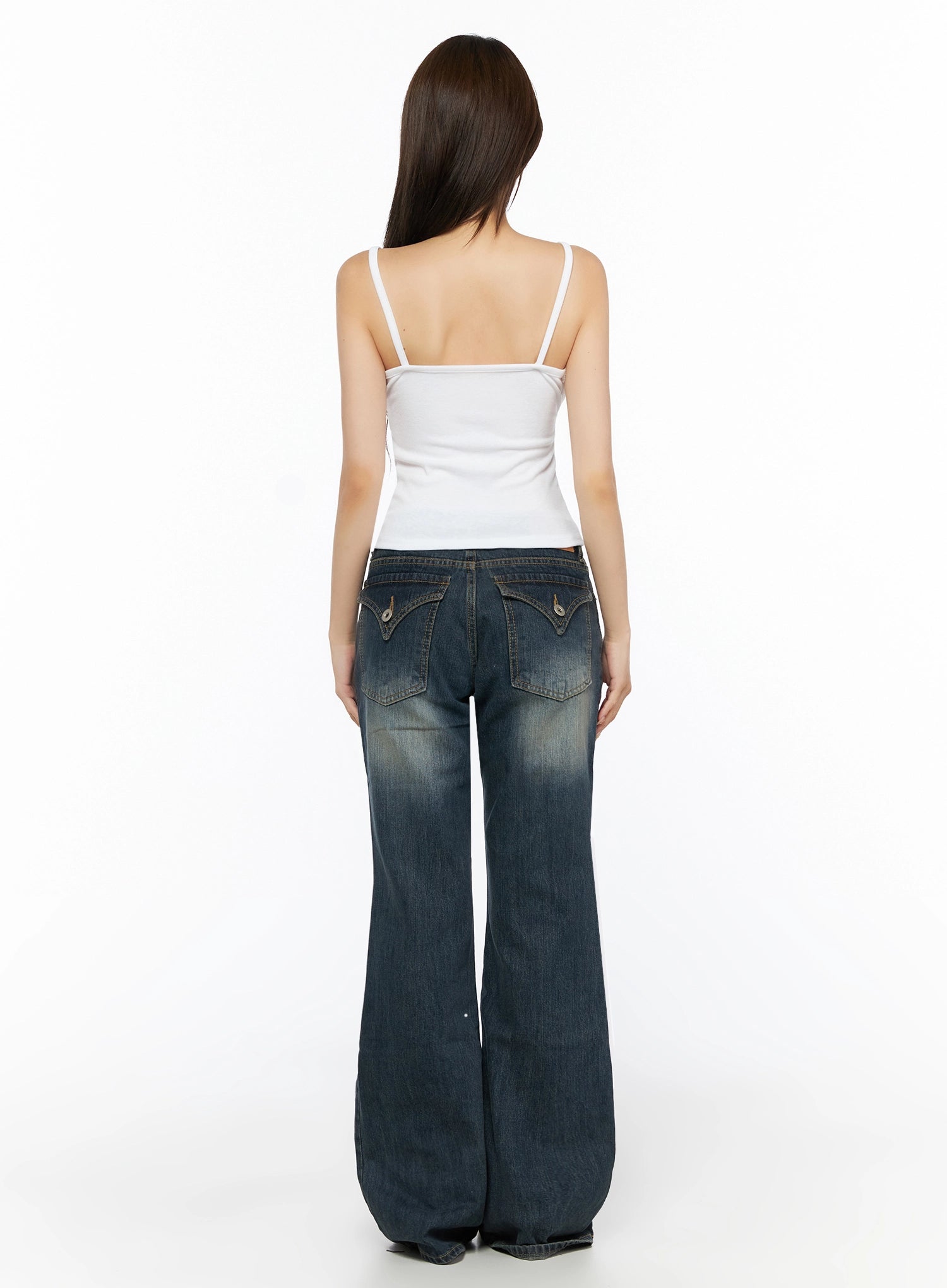Collins Vintage Washed Bootcut Jeans IL523 Dark blue back shot model in white cami top showing decorative back pockets with arc stitching and wide flared hem