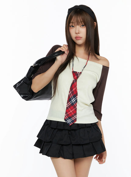 LEWKIN Color Block Off-Shoulder Tee IL523 Yellow S/M front shot on model styled with plaid tie and black bag, cream body with dark brown raglan sleeves