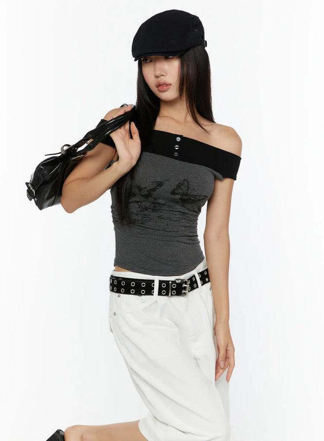 LEWKIN Color Contrast Off-Shoulder Graphic Top CU529 Dark gray S/M front model shot 3/4 angle with black baker boy cap and leather bag butterfly print striped crop top