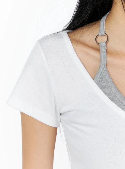 Contrast Ring Halter Layered Top IL516 White close-up detail shot shoulder and V-neckline showing gray halter strap with silver ring hardware