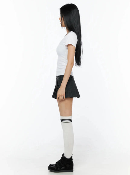 Contrast Ring Halter Layered Top IL516 White full-length side shot model standing slim-fit short-sleeve ribbed cotton tee with pleated skirt styling