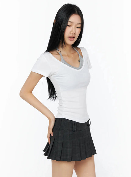 Contrast Ring Halter Layered Top IL516 White side shot model looking down hand on hip slim-fit ribbed tee with gray ring halter layered detail