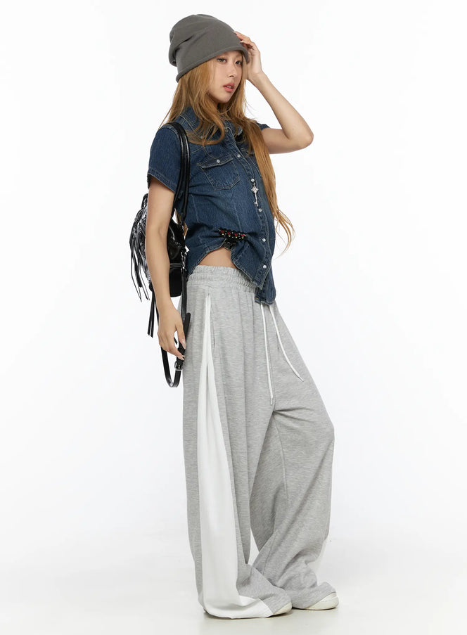 Contrast Wide-Leg Sweatpants CL528 Gray side view on model styled with denim shirt gray beanie and black fringe backpack showing voluminous silhouette