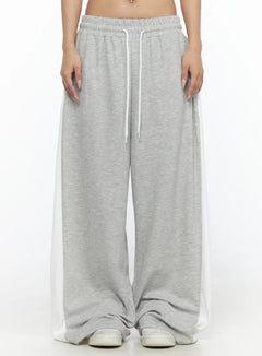 LEWKIN Contrast Wide-Leg Sweatpants CL528 Gray front view on model cropped at waist showing white drawstring elastic waistband and side contrast panels