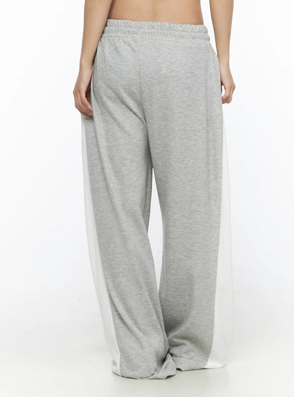 Contrast Wide-Leg Sweatpants CL528 Gray back view on model showing full-length wide-leg silhouette white side panels and elastic waistband