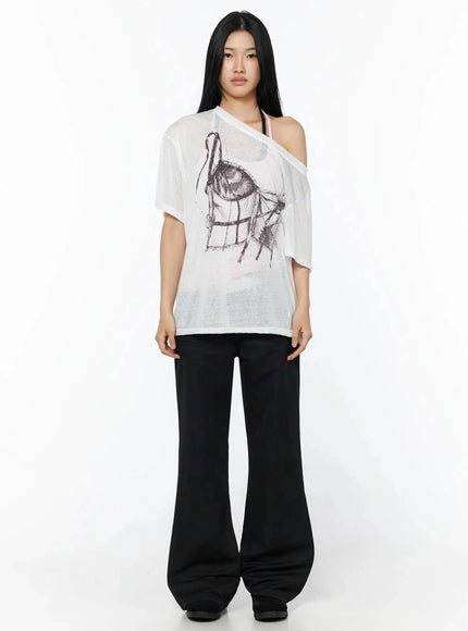 Corset Graphic Off-Shoulder Oversized Tee IL516 White full-body front shot model standing neutral pose sheer oversized tee corset graphic print off-shoulder black flare pants