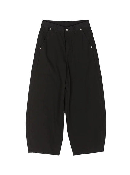 Cotton Balloon Pants IL502 Black flat-lay front view, showing full balloon silhouette, V-shaped waistband, silver rivets and extreme wide curved legs