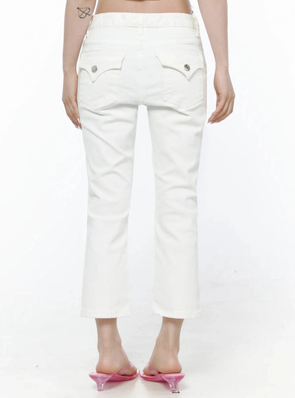 Cotton Capri Trousers IL506 White back waist-down shot on model showing curved back pockets with silver snap buttons, slight flare hem, pink heels