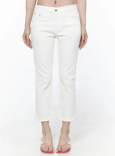 LEWKIN Cotton Capri Trousers IL506 White Size S front view on model waist-down, silver button closure, slim straight crop leg, pink flip-flops
