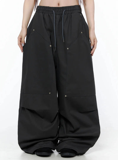 LEWKIN Cotton Carpenter Wide Pants IL502 Dark gray front view on model size M/L with elastic drawstring waist and metal eyelet details