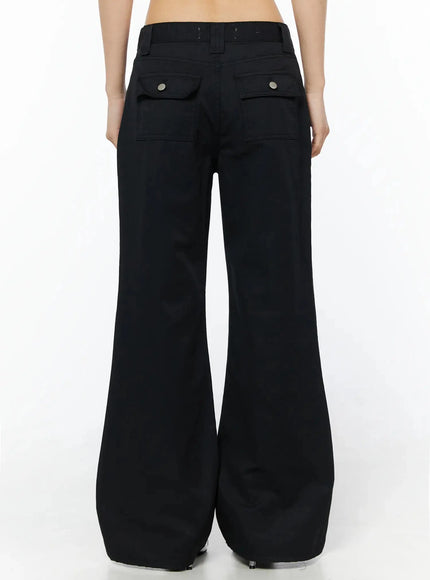 Cotton Pocket Bootcut Pants IL516 Black back view on model from waist down, dual rear flap pockets with silver snap buttons, wide flared leg