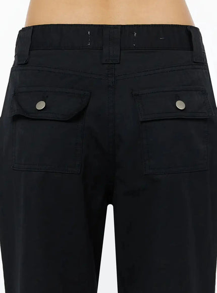Cotton Pocket Bootcut Pants IL516 Black close-up back detail, two rear cargo flap pockets with silver snaps, belt loop waistband texture