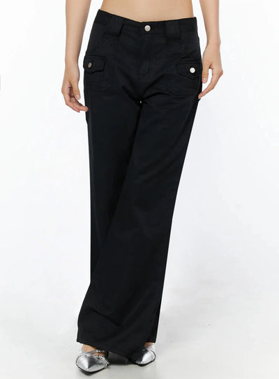 LEWKIN Cotton Pocket Bootcut Pants IL516 Black front view on model size S, wide-leg silhouette with silver button flap pockets, silver mule shoes
