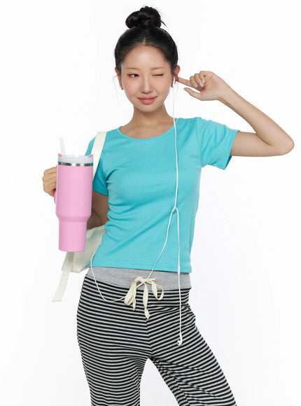 LEWKIN Cotton U-Neck Basic Tee CL513 Mint S/M front model shot winking pose holding pink tumbler with white crossbody bag ribbed fitted crop tee