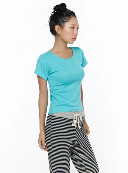 Cotton U-Neck Basic Tee CL513 Mint three-quarter front side model shot turned slightly left showing ribbed texture scoop neckline fitted short sleeves