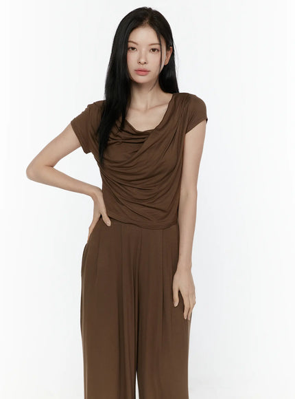 Cowl Neck Top and Loose-Fit Pants Set IL506 Brown close-up upper body model hand on hip asymmetric cowl neck drape detail soft jersey texture