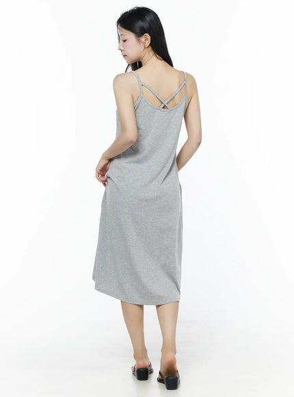 Criss-Cross Strap Maxi Dress IU525 Gray back view full-length on model revealing cross-strap detail at back neckline, heathered gray maxi skirt flare and black mule sandals