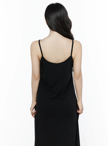 Criss-Cross Strap Maxi Dress IU525 Black back view on model showing open low scoop back with thin spaghetti straps and flowy midi hem