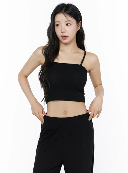 Crop Cami, Cardigan & Sweatpants Set IU525 Black front close-up on model hands-on-waist pose showing square-neck crop cami alone without cardigan, midriff exposed