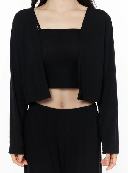 Crop Cami, Cardigan & Sweatpants Set IU525 Black front detail close-up on model showing open-front cropped cardigan layered over square-neck cami and elastic waistband of wide-leg pants