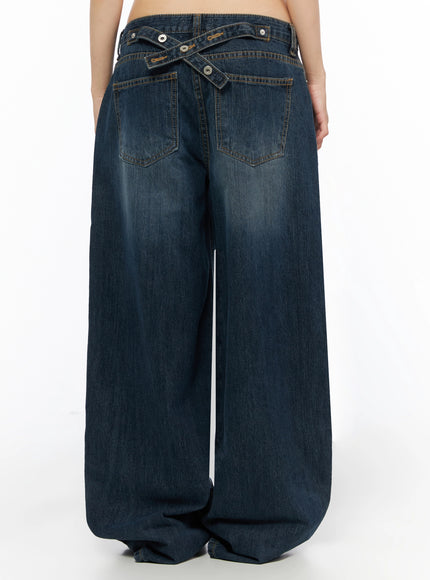 Cruz Wide Leg Jeans IL523 Dark blue back view from waist down on model, crossover snap-button tab waistband detail, two back pockets, wide-leg pooled hem