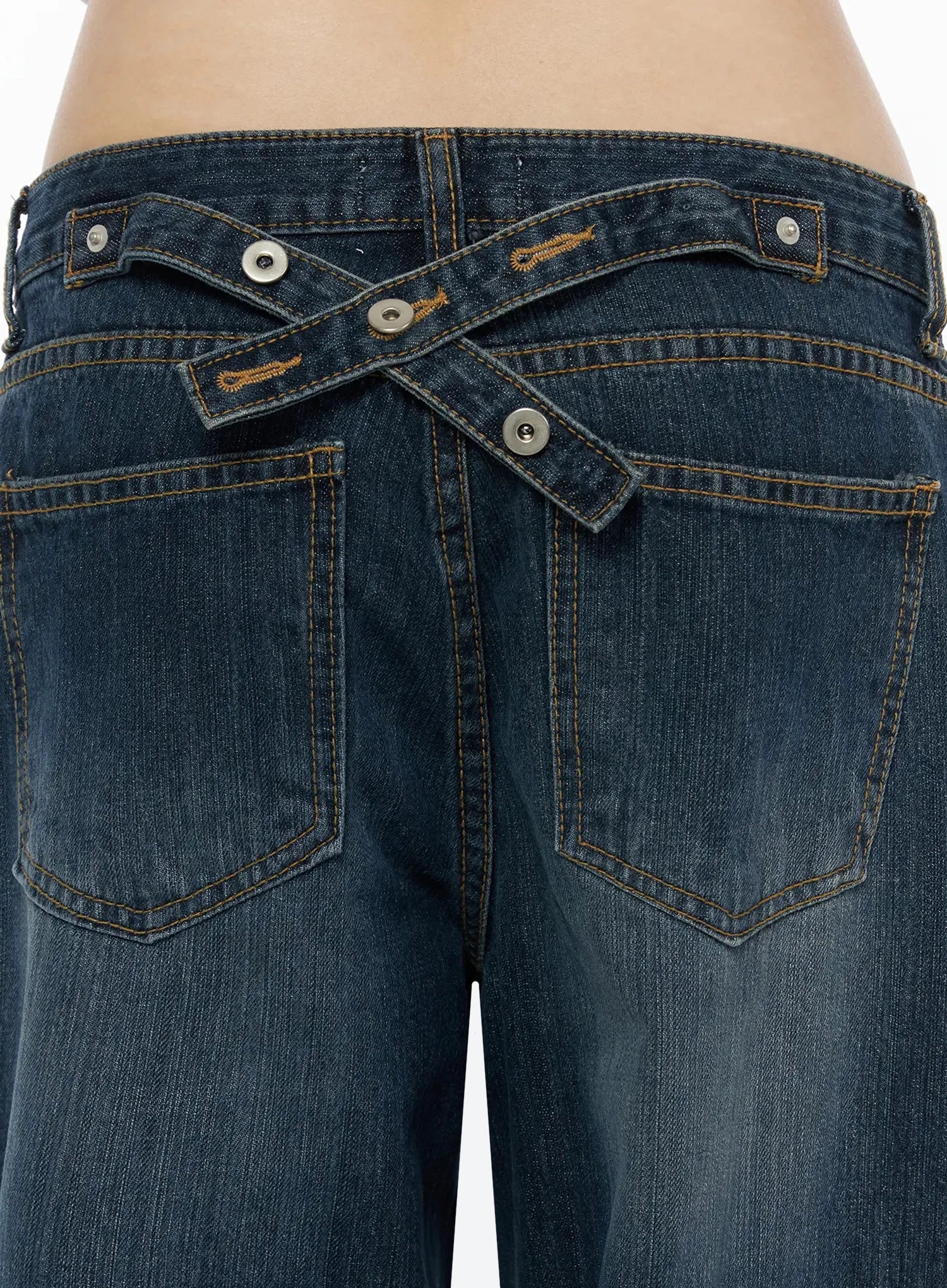 Cruz Wide Leg Jeans IL523 Dark blue close-up detail of back waistband, crossover snap-button tab closure, contrast orange stitching, washed denim texture