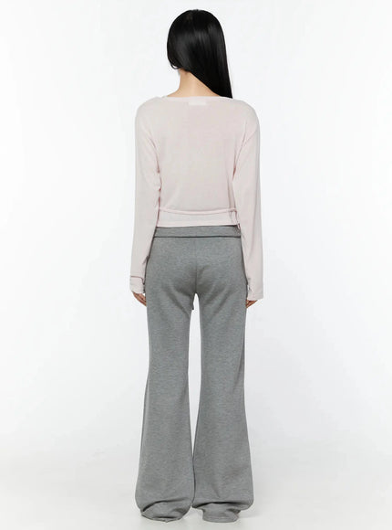 Cuffed Flare Lounge Pants IU524 Gray back full-length shot on model wearing pink top showing clean back yoke folded waistband and flared hem
