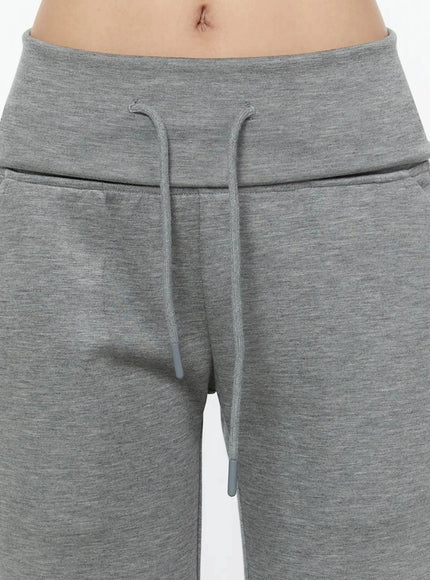 Cuffed Flare Lounge Pants IU524 Gray close-up detail of drawstring waistband showing folded cuff band and gray cord with rubber aglets