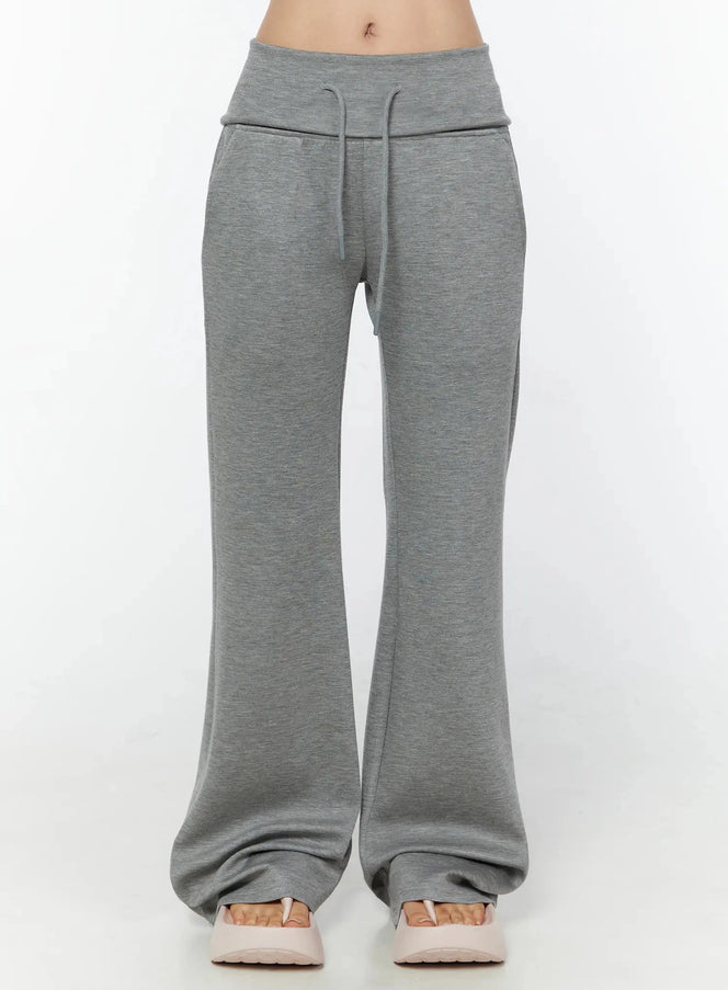LEWKIN Cuffed Flare Lounge Pants IU524 Gray S/M front crop shot on model showing drawstring waistband and wide-leg silhouette in heathered fleece