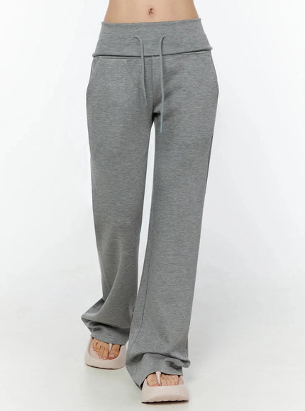 Cuffed Flare Lounge Pants IU524 Gray front crop shot on model from waist to ankle showing drawstring folded band and slight flare leg in heathered fabric