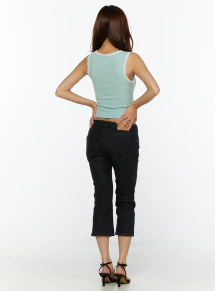 Cyril Low-Rise Capri Jeans CL515 Black full-body back shot on model wearing mint lace-trim tank showing ribbed texture and low-rise back waistband