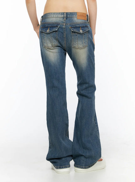 Dawn Low Rise Bootcut Jeans CU530 Blue full-length back shot on model showing flap back pockets, flared hem, ozbridge label and bootcut silhouette