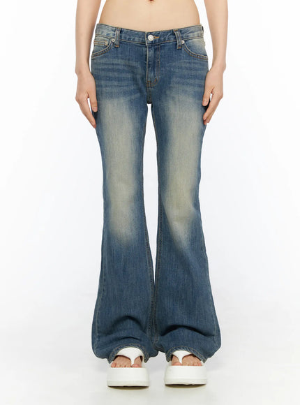 Dawn Low Rise Bootcut Jeans CU530 Blue front shot on model showing wide flared bootcut hem, low-rise waistband and vintage sand-washed denim fabric