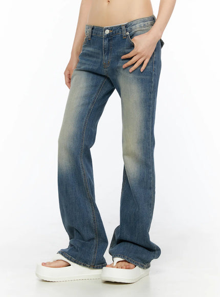 Dawn Low Rise Bootcut Jeans CU530 Blue side shot on model with hand in pocket showing bootcut silhouette, low rise fit and washed denim texture