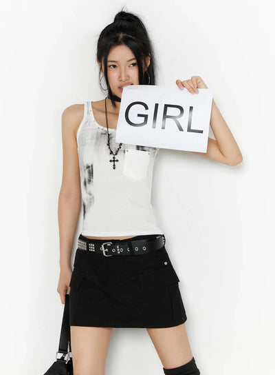 LEWKIN Dirty Wash Chest Pocket Tank Top IL509 White S/M front shot on model holding GIRL sign styled with black mini skirt and studded belt