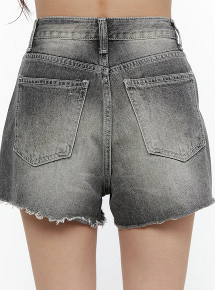 Distressed Mini Denim Shorts CL507 Black close-up back detail showing dual patch pockets, contrast stitching, acid-wash fade, and raw frayed hem