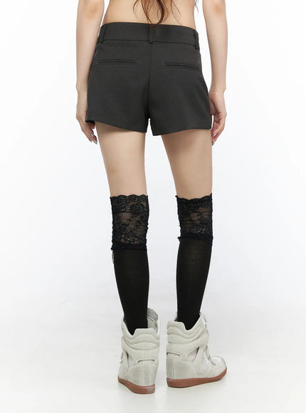 Double Button Low-Rise Shorts CL523 Dark gray back shot model showing rear welt pockets and low-rise waistband styled with lace knee-high socks