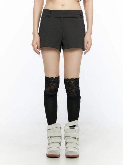 Double Button Low-Rise Shorts CL523 Dark gray front close-up model wearing low-rise shorts with double button waist detail and lace knee-high socks
