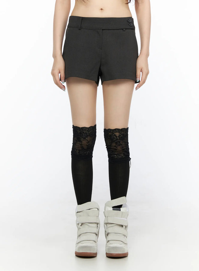Double Button Low-Rise Shorts CL523 Dark gray front close-up model wearing low-rise shorts with double button waist detail and lace knee-high socks