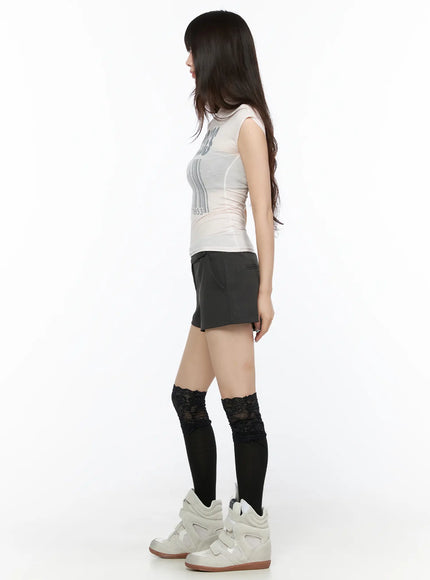 Double Button Low-Rise Shorts CL523 Dark gray full-body side shot model in sleeveless top showing side silhouette of low-rise shorts with lace socks