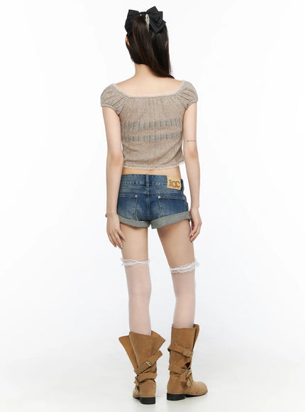 Double Button Roll-Up Denim Shorts CL523 Blue full-body back shot on model in beige knit crop top, standing straight showing rear pockets, brand patch, and lace thigh-high socks