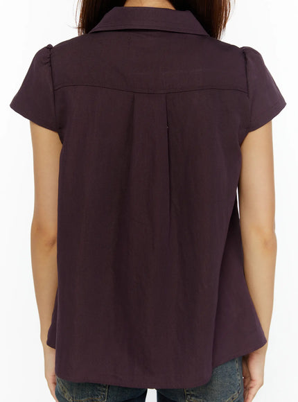 Double-Button Short Sleeve Blouse CL515 dark purple back close-up model showing back yoke seam center pleat collar and cap sleeve puff detail