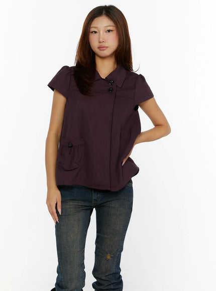 Double-Button Short Sleeve Blouse CL515 dark purple front view model standing hands at sides showing A-line silhouette and ruched patch pocket