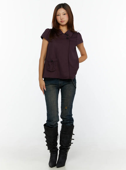Double-Button Short Sleeve Blouse CL515 dark purple full-length front view model standing styled with distressed jeans and tall buckle boots no accessories