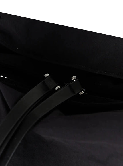 Double Pocket Shoulder Bag IL516 close-up interior detail view showing black lining leather handle attachment with silver rivets and fabric construction
