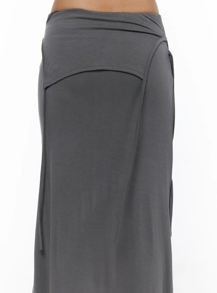 Draped Maxi Skirt CL503 Dark gray close-up detail of right-side paneling, diagonal seam, and smooth waistband fold on model